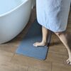 Tapis de bain en pierre naturelle - Séchage rapide et sécurité antidérapante