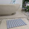 Tapis en pierre pour salle de bain, séchage instantané.